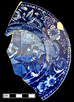 Pearlware London-shape cup and saucer reverse printed in dark blue. Printed mark on reverse of saucer with Christmas Eve (pattern name) and manufacturer (Clews). 4” cup rim diameter; 2.5” cup height; 5.75” saucer rim diameter; 1” saucer height. Note impressed asterisk mark in center of printed mark. Also impressed maker’s mark for James and Ralph Clews (1814-1834), Cobridge.